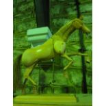 A good quality polished timber anatomical lay model of a horse with extensively jointed body in