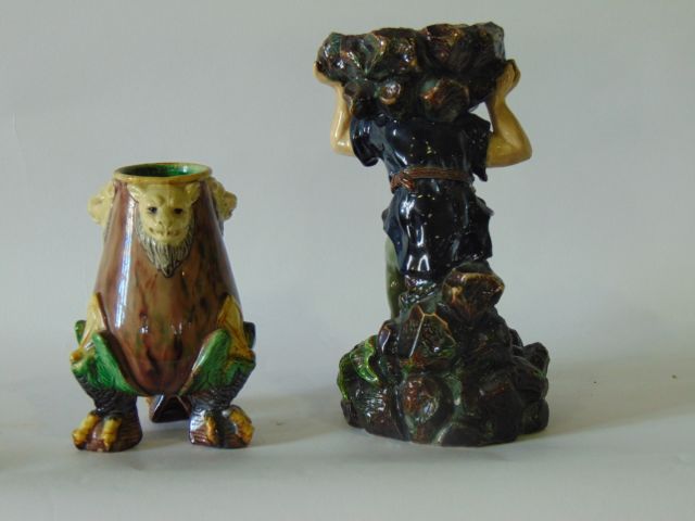 A 19th century continental majolica stand in the form of a bearded dwarf supporting a heavy load and - Image 2 of 2