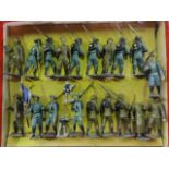 A boxed set of French antique painted lead figures of soldiers, ten in pale blue uniform, one of