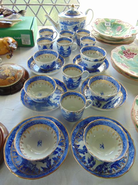 A collection of early 19th century blue and white printed tea wares with chinoiserie, pagoda and - Image 2 of 2