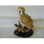 A substantial model of a barn owl produced by David Ivey for Brooks & Bentley, 43 cm tall approx