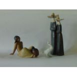 A collection of three pieces of Lladro Daisa ware comprising a matt glazed model of two nuns, a matt