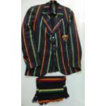 A vintage school blazer, the blue ground striped in shades of mustard, purple, cream and green, with