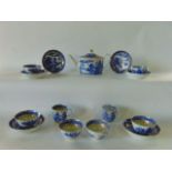 A collection of early 19th century blue and white printed tea wares with chinoiserie, pagoda and