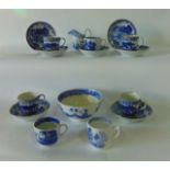 A collection of early 19th century blue and white printed tea wares of wrythen moulded form with