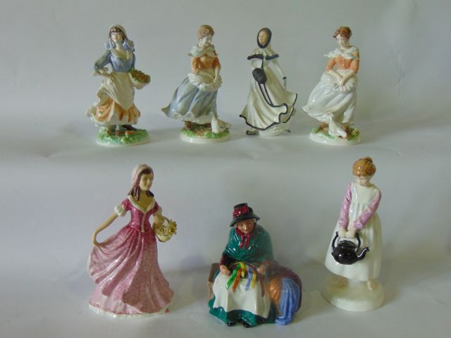 A Royal Doulton figure - Silks and Ribbons HN2017 together with a set of three Royal Worcester