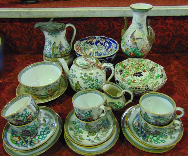 A collection of 19th century teawares with painted and infilled chinoiserie decoration comprising