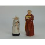 Two Royal Worcester candle snuffers in the form of a monk and a nun, both with puce printed marks to