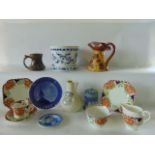 A collection of 19th century and other ceramics including a pair of continental cachepot with blue