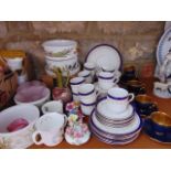 A collection of Crown Devon coffee wares with blue and gilt glazed finish comprising five coffee