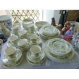 A quantity of Royal Doulton Tonkin pattern dinner and tea wares number TC1107 comprising a pair of