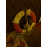 Two vintage wooden nautical tackle blocks, an anchor and a life buoyancy ring