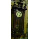 A 19th century continental Vienna style wall clock, the eight day weight driven movement with