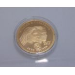 A Tristan da Cunha 22ct Gold William & Kate Classic Portrait One Ounce Proof coin, 2011, fitted