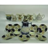 A collection of 19th century Gaudy type ceramics including a pair of jugs, a further jug with