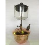 A Tilley lamp with copper fount base supporting a Pyrex heat resistant shade No 171, 34 cm tall