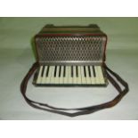 A vintage Hohner Carmen Acordian 1, 19 cm tall x 37 cm long approx (when bellows closed)