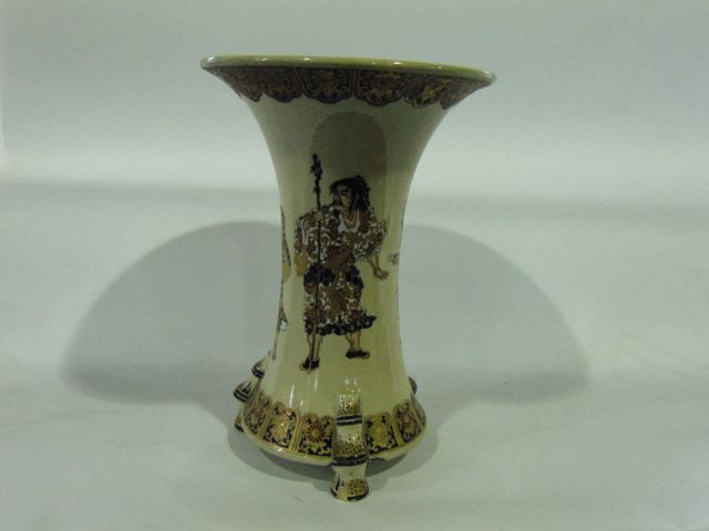 An early 20th century Satsuma vase of waisted form painted with four male characters in various