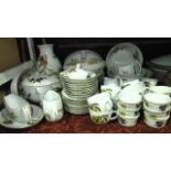 An extensive collection of Royal Worcester Evesham pattern oven-to-table wares including a large