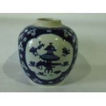 A 19th century oriental blue and white ginger jar base with three reserved panels of vases,