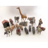 A quantity of vintage painted lead models of mostly farmyard animals to include cows, pigs, sheep,