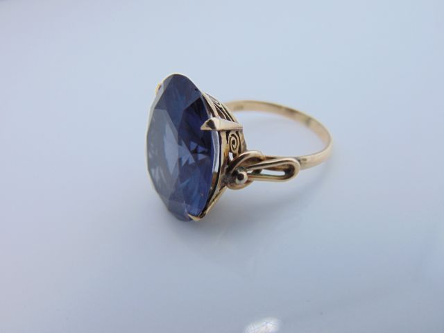 A synthetic alexandrite dress ring, set with an oval mixed-cut synthetic alexandrite weighing - Image 2 of 2