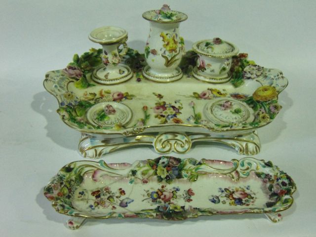A good quality early 19th century standish in the Coalport manner with floral encrusted decoration