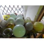A quantity of vintage gas and oil lampshades to include six spherical opaque examples, a further