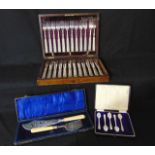 A good quality cased set of twelve silver plated fish knives and forks all with double struck fluted