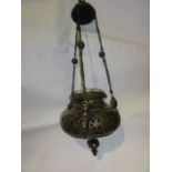 An unusual European bronze pierced lantern/burner of bulbous form with three applied mounts in the