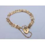 A 9ct gold gate-link bracelet, with heart-shaped padlock clasp, 5.2g