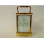 A good quality French carriage clock in the traditional style, the eight day movement with strike