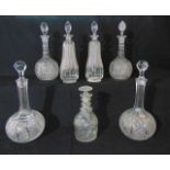 Three pairs of good quality decanters to include a pair of 19th century shaft and globe examples