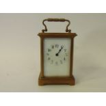 A simple French brass carriage clock with eight day timepiece (working)