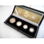 A 22ct Rose Gold Four-Coin Proof Sovereign Set, 2002, comprising: £5, £2, a Sovereign and a Half-