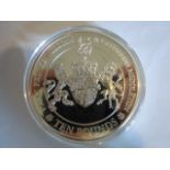 A Tristan de Cunha Sterling Silver Prince's Arms Five Ounce Ten Pounds Proof, 2011, Prince William &