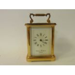 A good quality English carriage clock by Charles Frodsham, the eight day movement striking on a bell