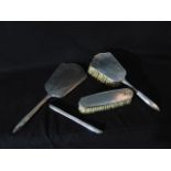 A silver dressing set, W. G. Sothers Ltd, Birmingham, 1957 & 1961, comprising: a hand mirror, a hair