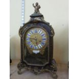 An early 19th century French bracket clock with boulle work case inlaid with brassware, overlaid