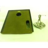 A vintage patent How 2 Putt (pending) faux green with ebonised kick stand framework bearing