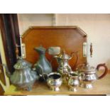 A three piece tea set comprising teapot, hot water pot, two handled sugar basin and milk jug, all by