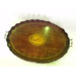 A good quality Georgian mahogany tray of oval form with central satinwood shell inlay and further