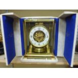 A Jaeger-Le Coultre Atmos clock number 241071 in polished brass case with original travelling case