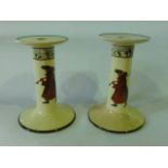 A pair of  19th century Doulton candlesticks of dumb-bell form from The Gallant Fishers Izaak Walton