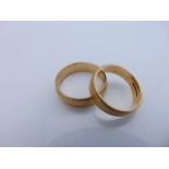 A 9ct gold wedding band, 3.2g, size O; and a 9ct gold wedding band, 4.2g, size S 1/2 (2)