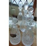 A pair of clear cut glass decanters with slice cut shoulders and coarse hob cut detail together with