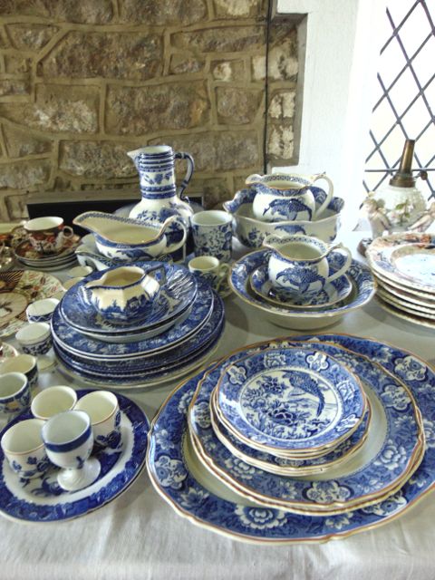 A collection of blue and white printed Aquila pattern wares comprising two graduated jugs, a bowl of