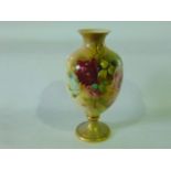 A Grainger Royal Worcester blush ivory vase of urn shaped form with painted pink rose decoration