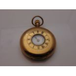 An American 9ct gold half hunter pocket watch, Waltham, the white enamelled dial with black Roman