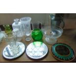 A selection of glassware to include a drinking vessel with heavy cut ringed detail and foot with